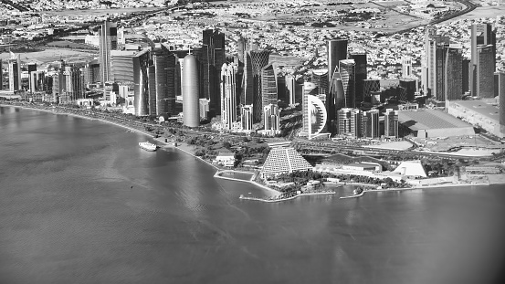 Doha skyline from the aircraft on a sunny day, Qatar.