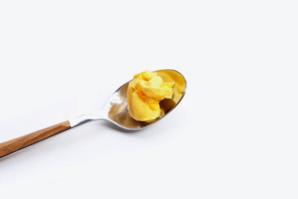istock Margarine cheese butter on white. 1459461156