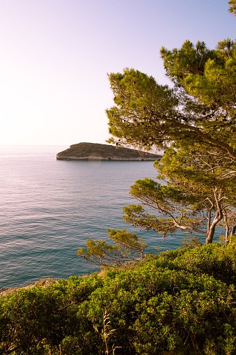 View to little island Campi seen from coastal road from Vieste to Mattinata at Gargano National Park, Apulia, Italy