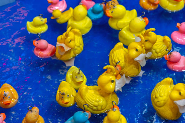 istock Rubber Ducks Fishing Pool 1459463267