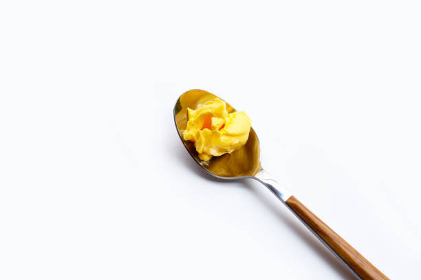 istock Margarine cheese butter on white. 1459467289