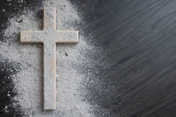 istock Wood cross covered in ashes 1459467336