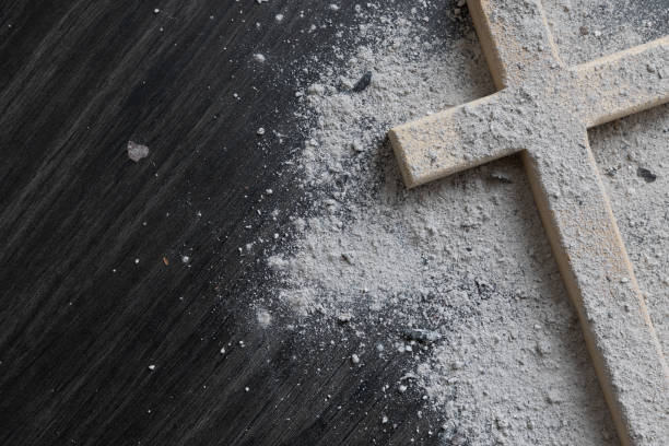 istock Wood cross covered in ashes 1459467346