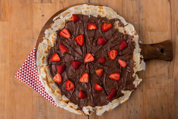 istock Dessert - Thin crust with hazelnut cream and strawberries 1459479421