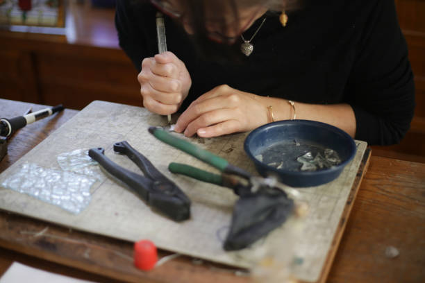 istock A woman making a stained glass work 1459479744
