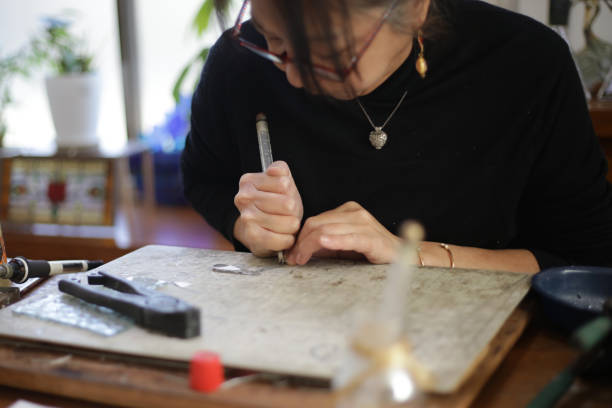 istock A woman making a stained glass work 1459479752