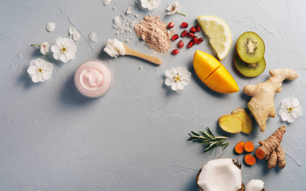 istock Ginger and mango skin care product with blossom 1459484732