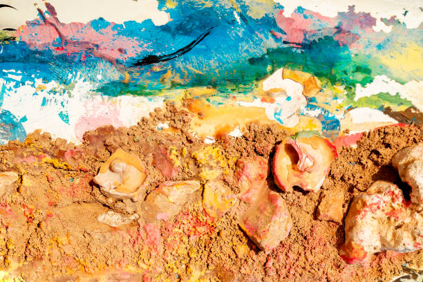 istock Multicolored paint and shells on the old cracked surface. Beautiful background, texture, creative design. 1459486784