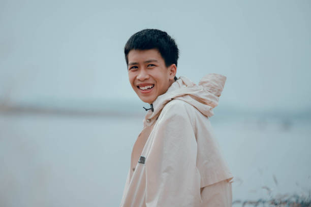 istock Asian boy smiling happy weekend. 1459487715