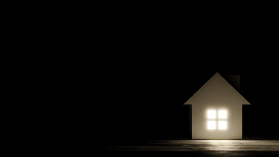 3D Illustration.White miniature house on black background. Light through the windows. Electricity. Light effect (horizontal).