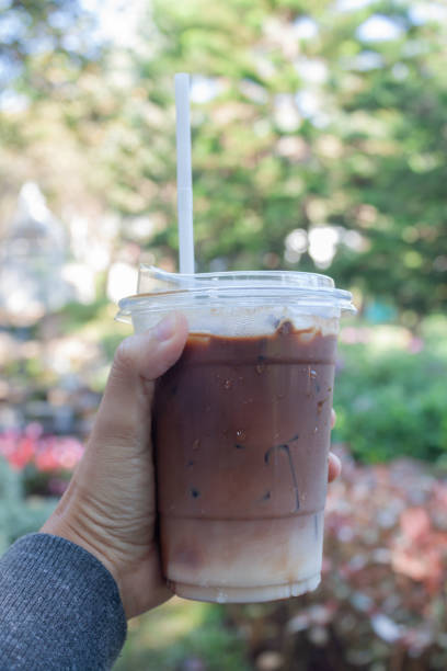 istock Woman hold her iced coffee 1459489406