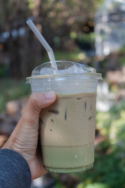 istock Woman hold her iced coffee 1459489408