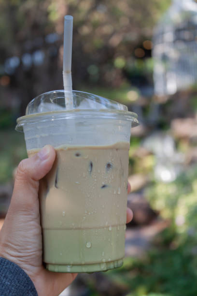 istock Woman hold her iced coffee 1459489423