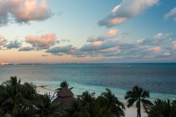 istock Beautiful clouds over ocean water in sunset 1459493103