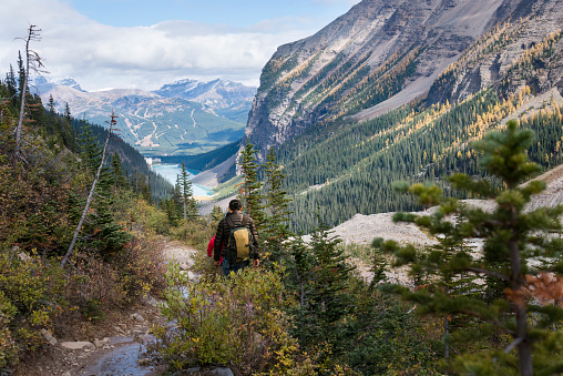 Hiking Plain of Six Glaciers track, Lake Louise in the distance. Banff National Park, Canada.