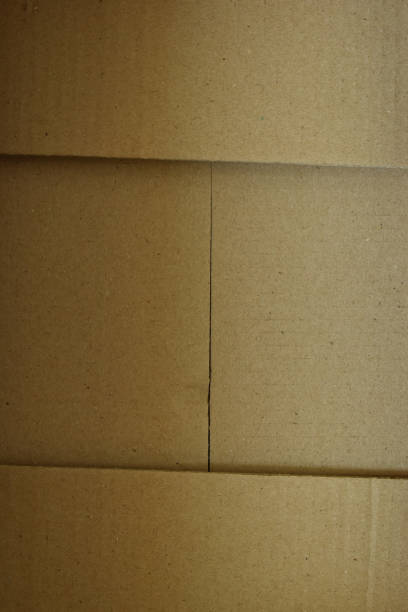 istock brown cardboard box, paper texture background 1459497823