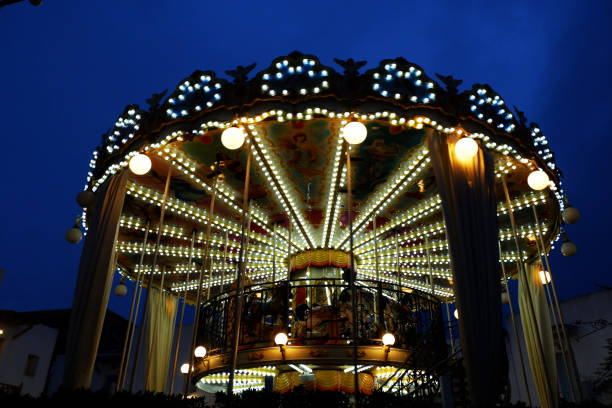 istock Marry Go Round Carousel at night time 1459502163