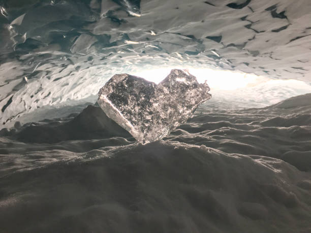 istock Heart shape ice in ice cave 1459502668