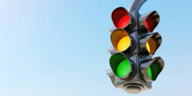 Photo of Double hanging traffic light with all three color on empty blue sky background. Space. 3d render