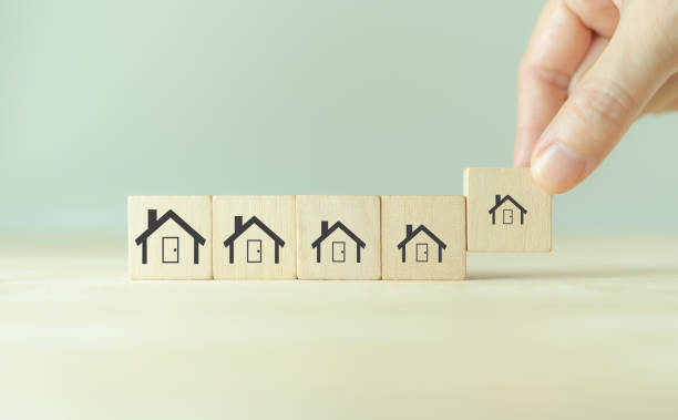 istock Downsizing home, houses concept. Downsizing property due to retirement or budget. Finding a tiny house or apartment. Moving to a smaller property for retirement time.  Increasing cash flow. 1459529505