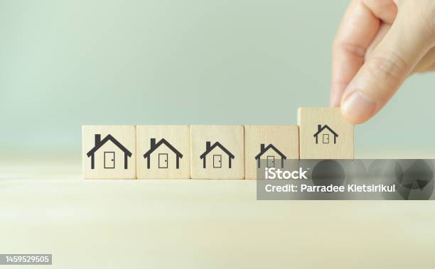 Downsizing Home Houses Concept Downsizing Property Due To Retirement Or Budget Finding A Tiny House Or Apartment Moving To A Smaller Property For Retirement Time Increasing Cash Flow Stock Photo - Download Image Now