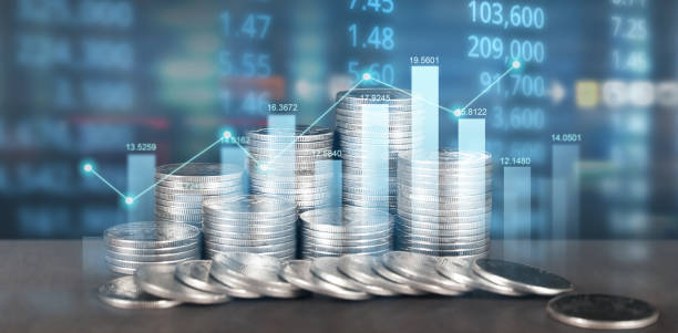 istock Stack of coin with trading graph, financial investment c 1459529703