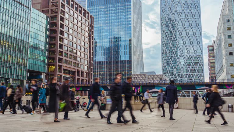 Time lapse of Crowd Commuter business office people walking in rush hour after working at Canary Wharf Station in London, United Kingdom