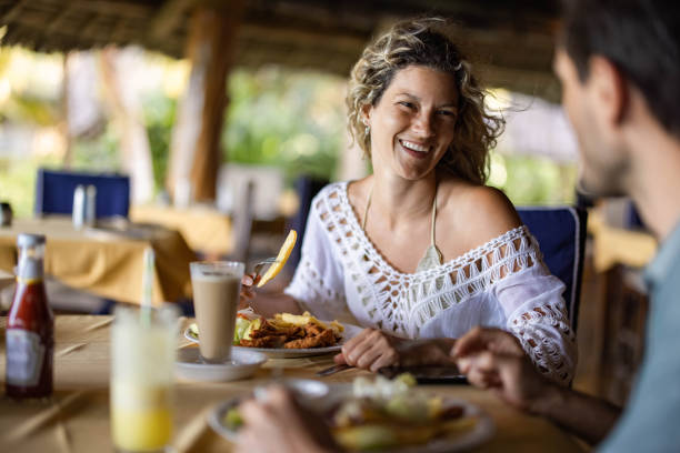 istock Happy couple communicating while being on a lunch in a restaurant. 1459538871