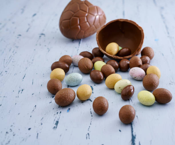 istock Easter composition with chocolate eggs on blue wooden background 1459540697