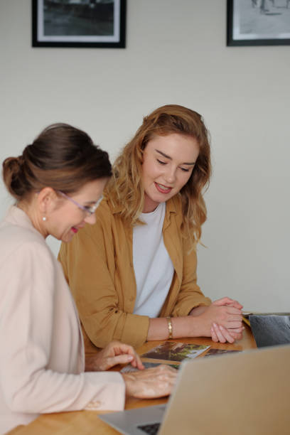 istock Photographer Talking to Gallery Manager 1459541621