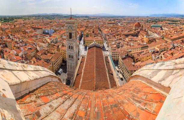 Brunelleschi dome, Giotto tower of Duomo Cathedral, Florence, Italy, aerial view Aerial view of the red tiled Brunelleschi dome of Duomo Cathedral or Cattedrale di Santa Maria del Fiore and Giotto bell tower in Florence, Italy filippo brunelleschi stock pictures, royalty-free photos & images