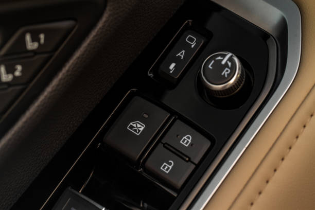 istock Car central door lock and unlock button close up. Close and open signs. 1459545481