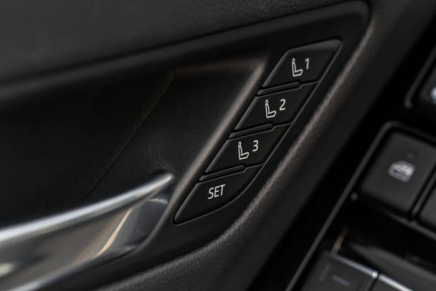 istock Electric car seat adjustment control panel close up view. Adjustable car seat position. Car interior. 1459545641