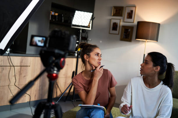 istock Two female vloggers making plan and discussing before recording 1459545831