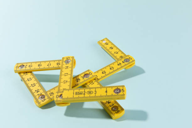 istock A carpenters ruler on cyan background 1459547304