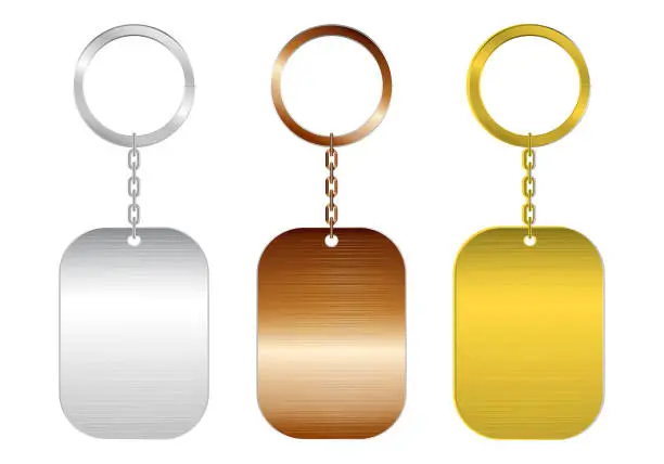 Vector illustration of set of high detailed and realistic steel metallic key chain isolated.