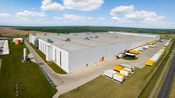 istock Large distribution warehouse building outside the city 1459553976