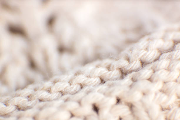 istock Textured background made with fabric mesh picked up in detail, close up. 1459557023