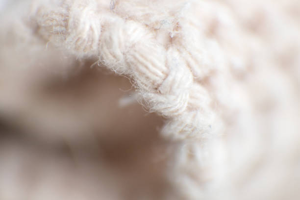 Textured background made with fabric mesh picked up in detail, close up.