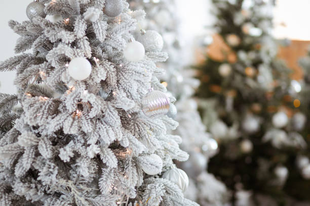 istock Background of artificial fir trees covered with artificial snow 1459557471