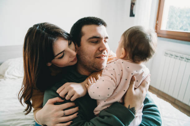 istock Happy family together at home 1459558059