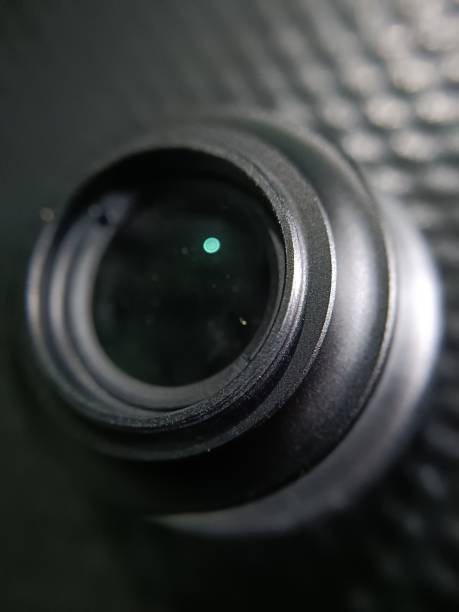 istock Vertical closeup of a professional camera lens 1459559849