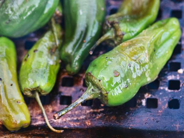 istock Closeup of roasted green peppers 1459561338