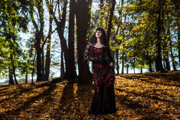 istock Scary corpse bride in the autumn forest 1459563451