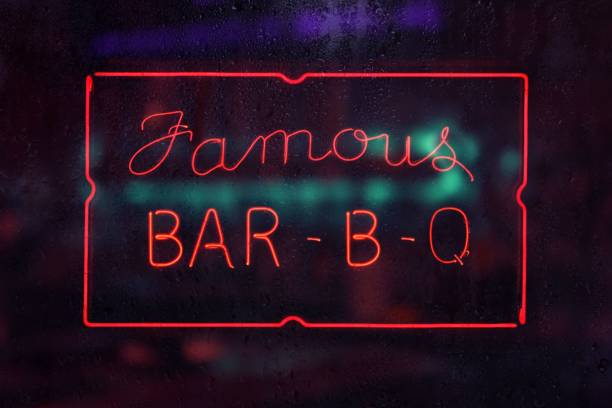 istock Old famous barbecue sign in rainy window 1459564821