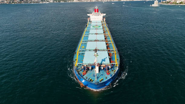 istock Aerial view of cargo ship in transit. 1459564829