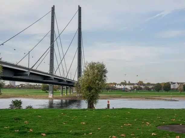 Photo of Closeup of the Oberkasseler Bridge over the Rhine river in Dusseldorf, Germany