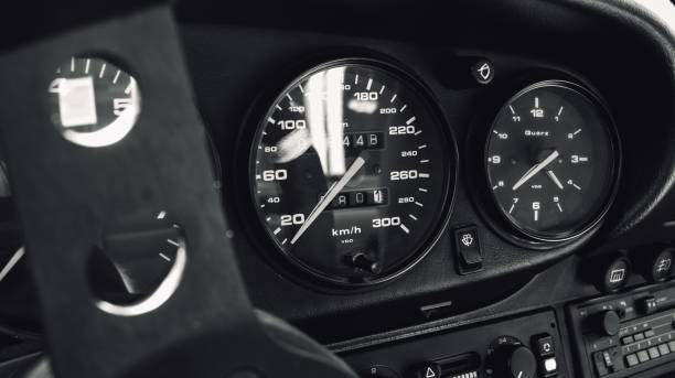 istock Black and white shot of a vintage car interior dashboard 1459565618