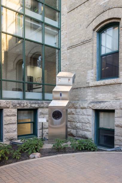 vertical shot of grain elevator sculpture at brandon university. manitoba, canada. - university of manitoba imagens e fotografias de stock