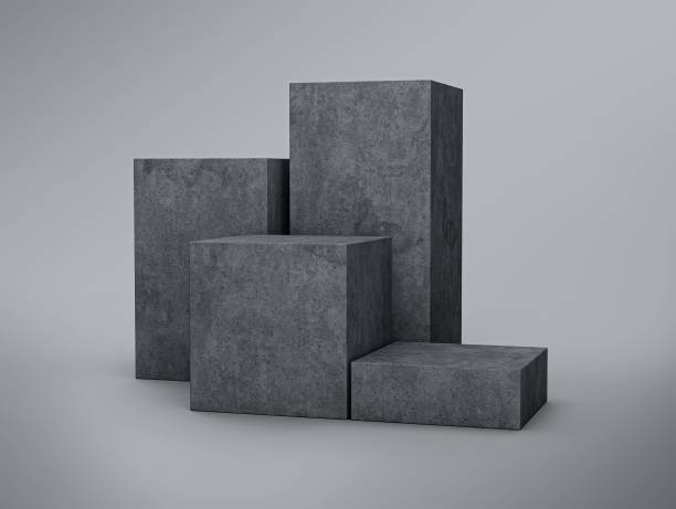 istock Greyscale shot of a stand podium made from grey concrete in four-step display 1459573130